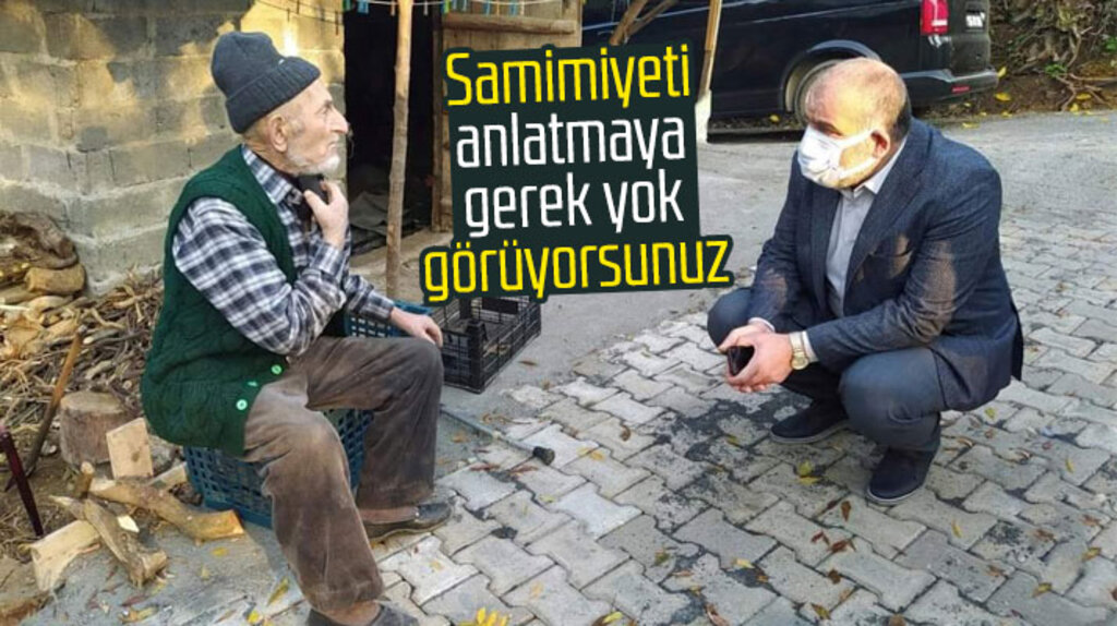 İbrahim Sandıkçı yaşlı vatandaş ile yanına çömelerek sohbet etti