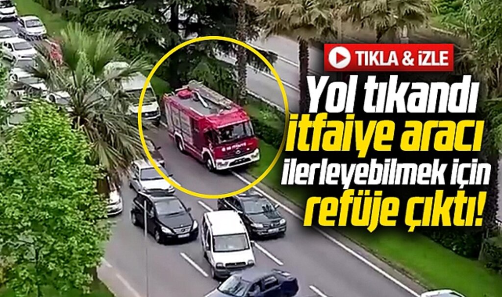 Samsun'da yangına giden itfaiye aracı yol tıkanınca refüje çıkmak zorunda kaldı