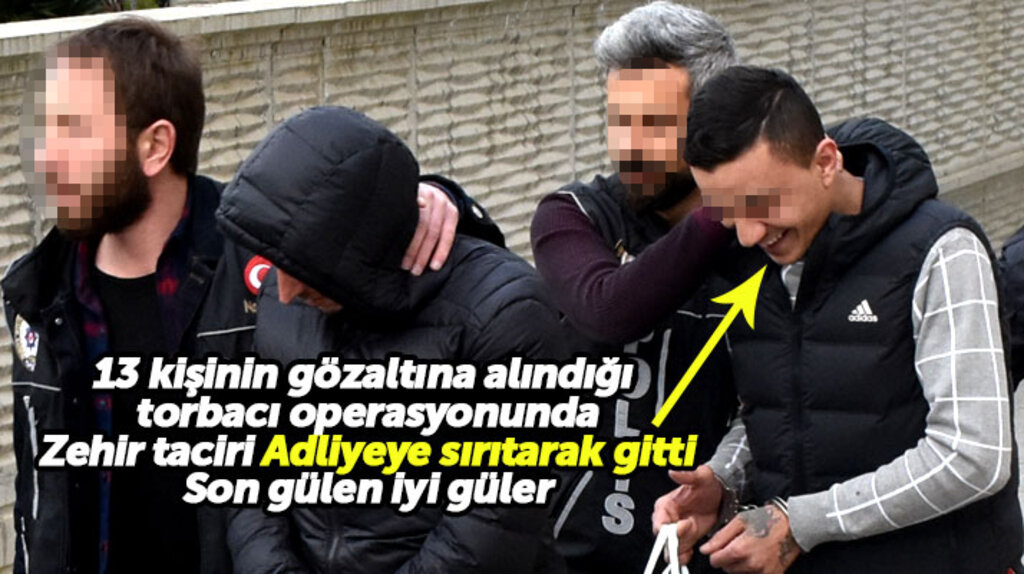 Samsun'da 13 kişinin gözaltına alındığı torbacı operasyonunda zehir taciri gülerek Adliyeye gitti